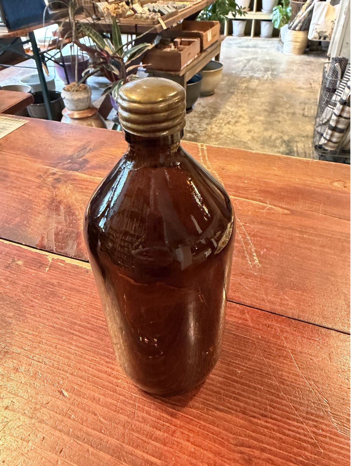vintage brown glass bottle - med