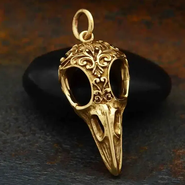 Raven Skull Charm with Scroll Carving, Material: bronze