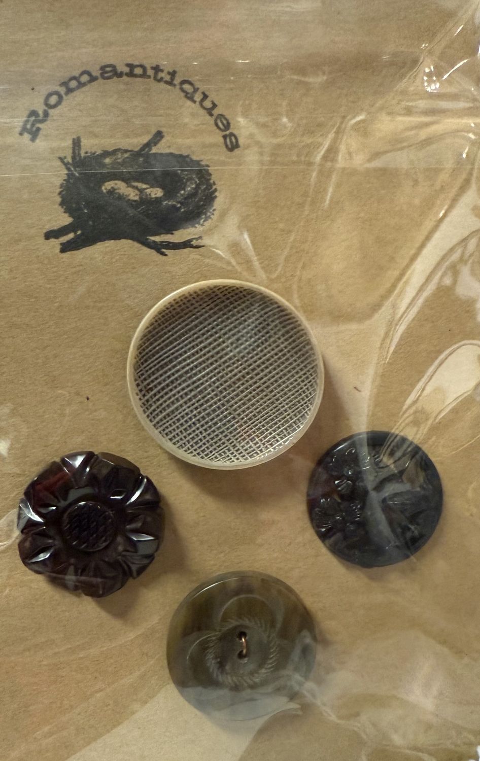 4 Bakelite and Early Plastic Buttons