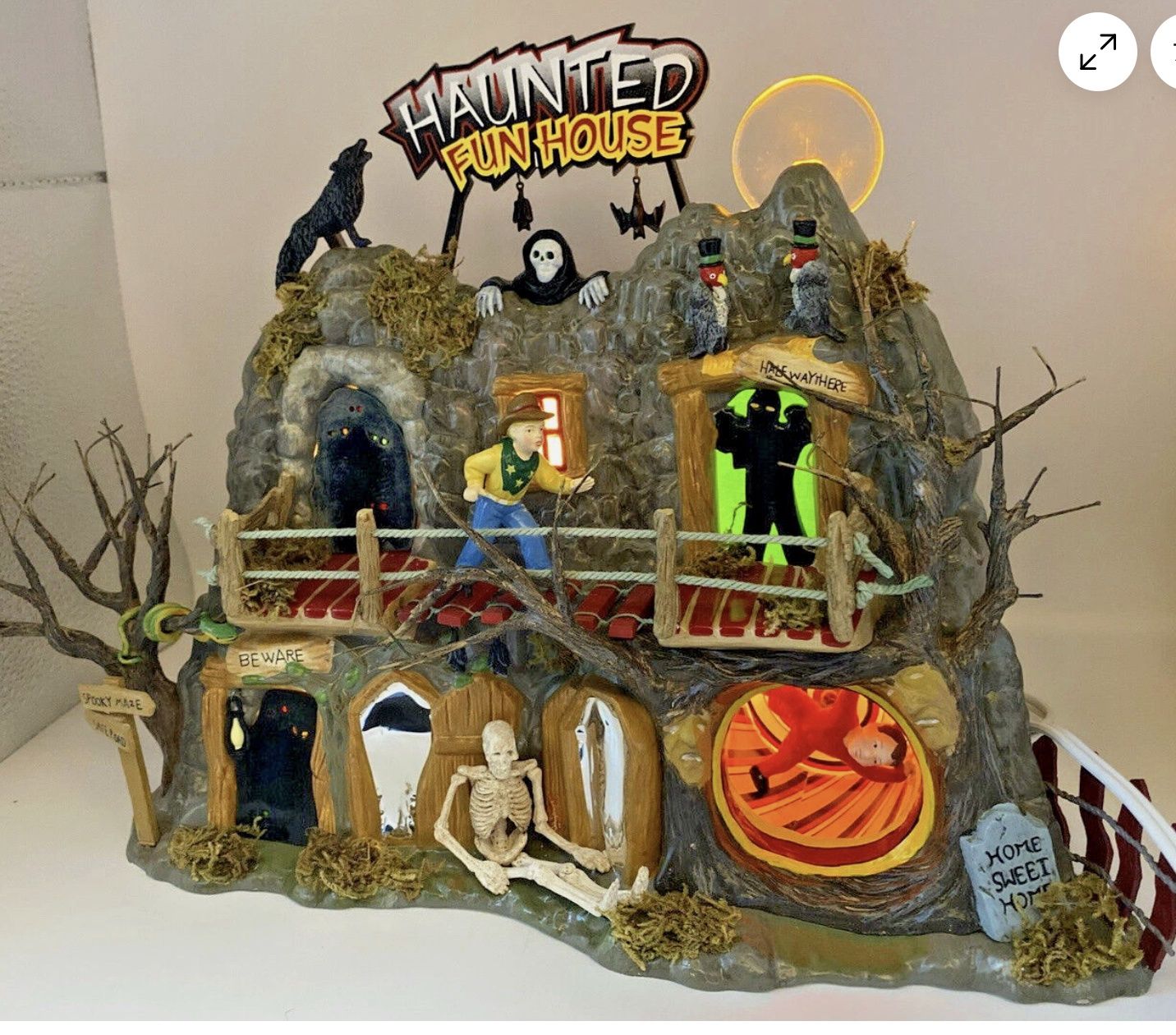 Dept. 56 halloween Haunted Fun House Electric Lights and Motion Original pkg. has issues , but the protective styrofoam is intact.