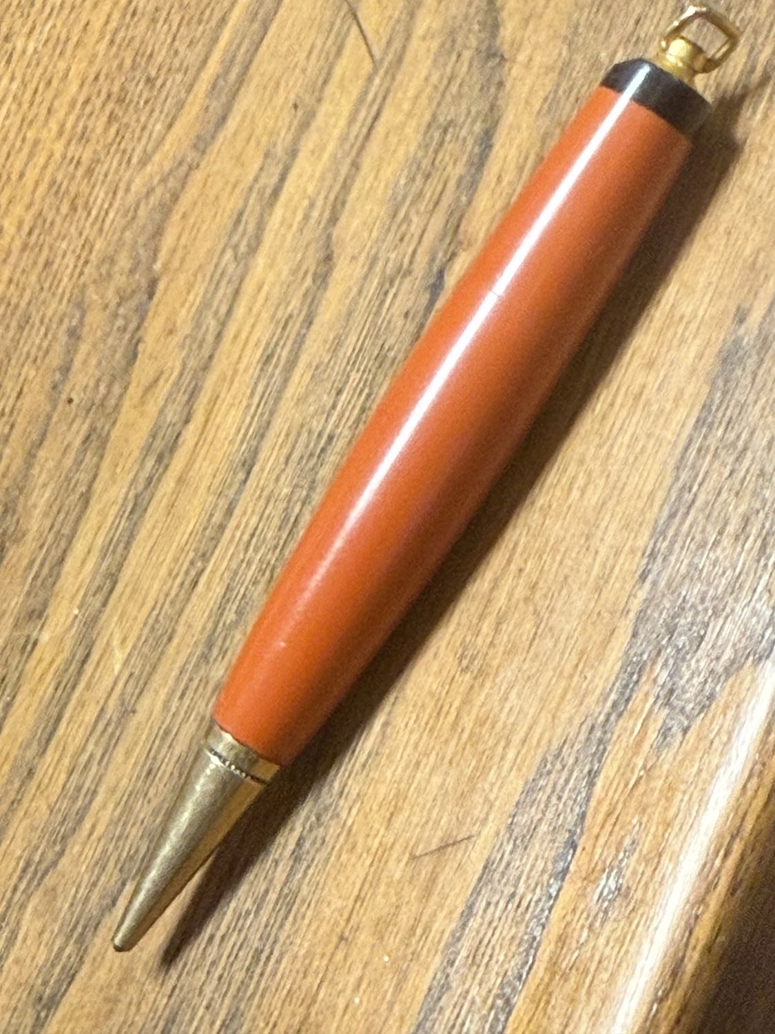 Vintage Orange and Black Bakelite w/Brass Mechanical Pencil Pendant