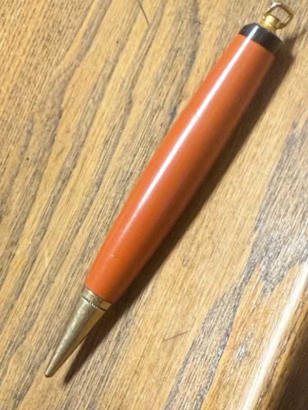 Vintage Orange and Black Bakelite w/Brass Mechanical Pencil Pendant