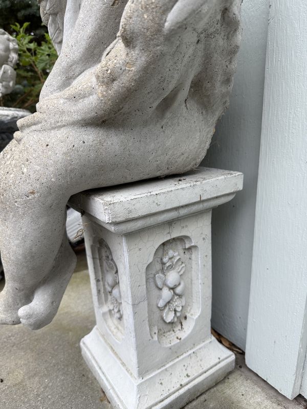 Cement Sullen Angel Seated on Plinth