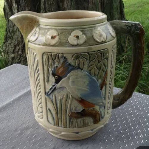 WELLER Pottery ZONA Line 1920&#39;s KINGFISHER Bird Pitcher w/ Panels of Cattails.. Made in the United States - designed by Rudolph Lorber (Chip on lip noted)