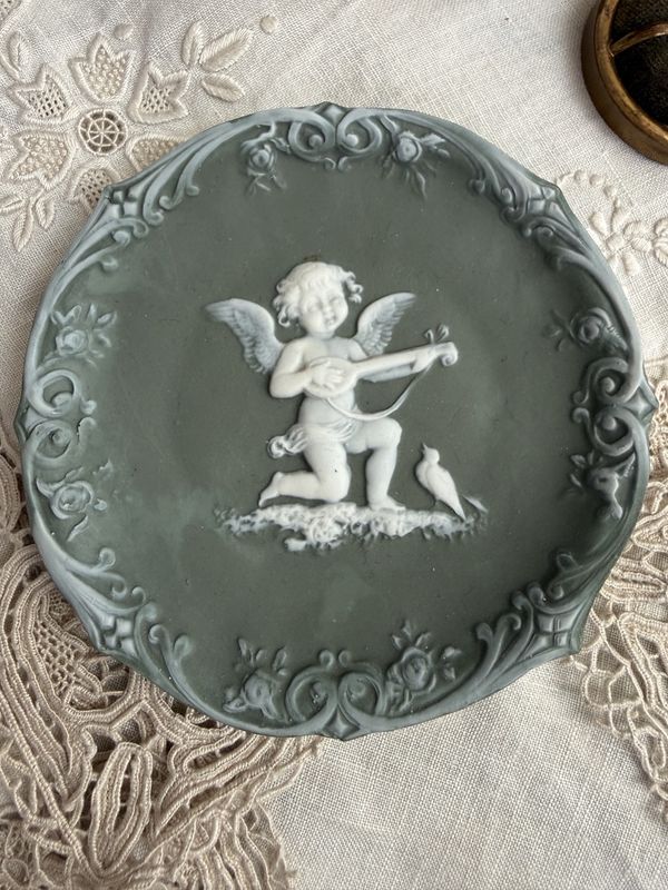 Antique Jasperware Green Porcelain Cupid Playing Lute for a Bird Wall Hanger