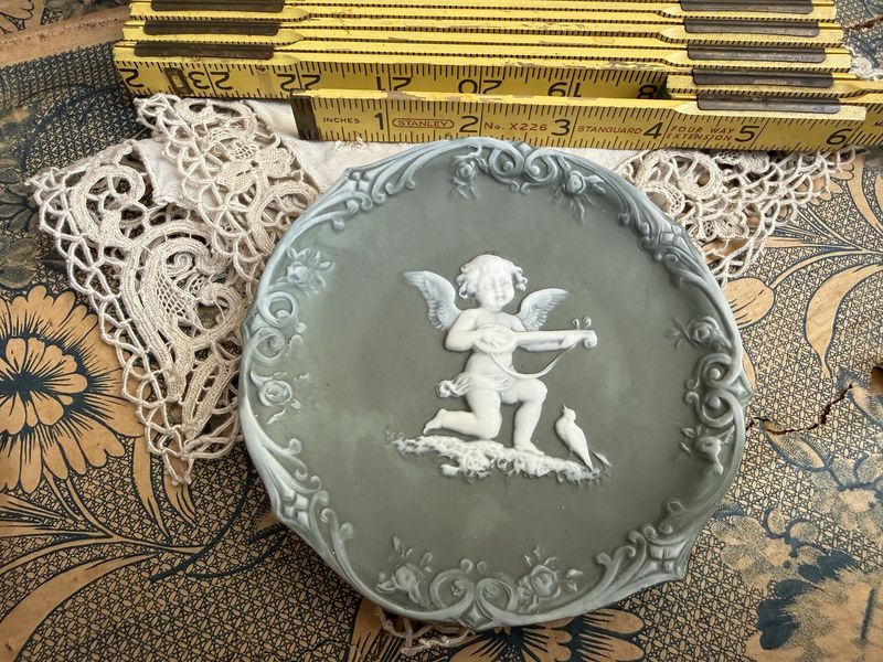 Antique Jasperware Green Porcelain Cupid Playing Lute for a Bird Wall Hanger