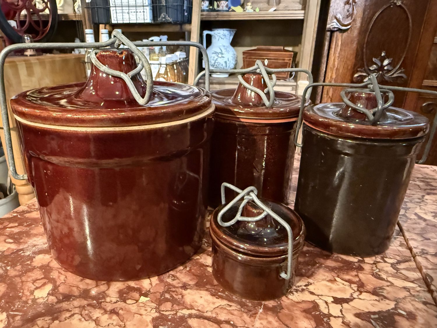 Set Four Graduated Sized Brown Ware Bale Handled Lidded Crocks