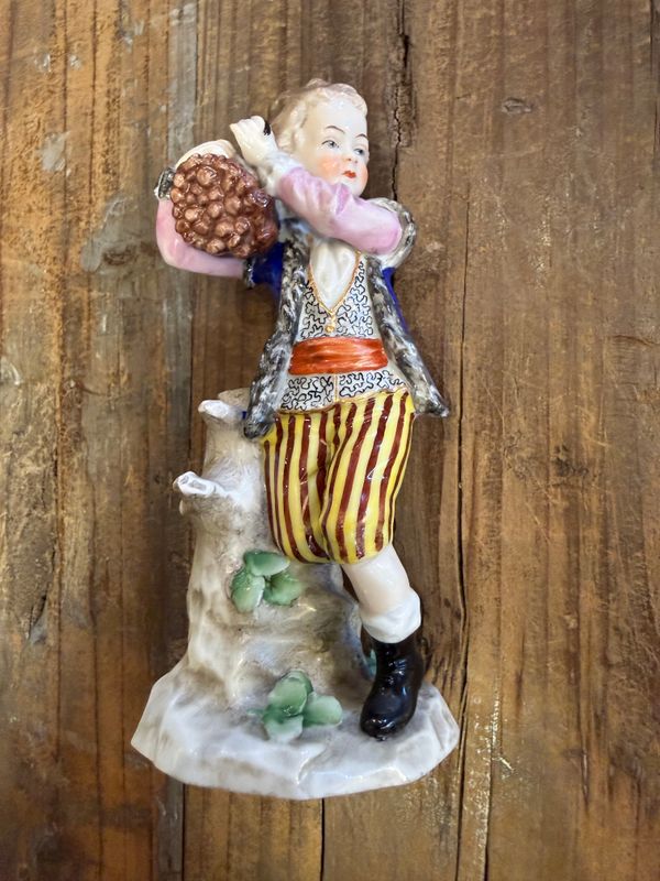 Chelsea Derby Victorian Porcelain Male Figure with Wood Bundle