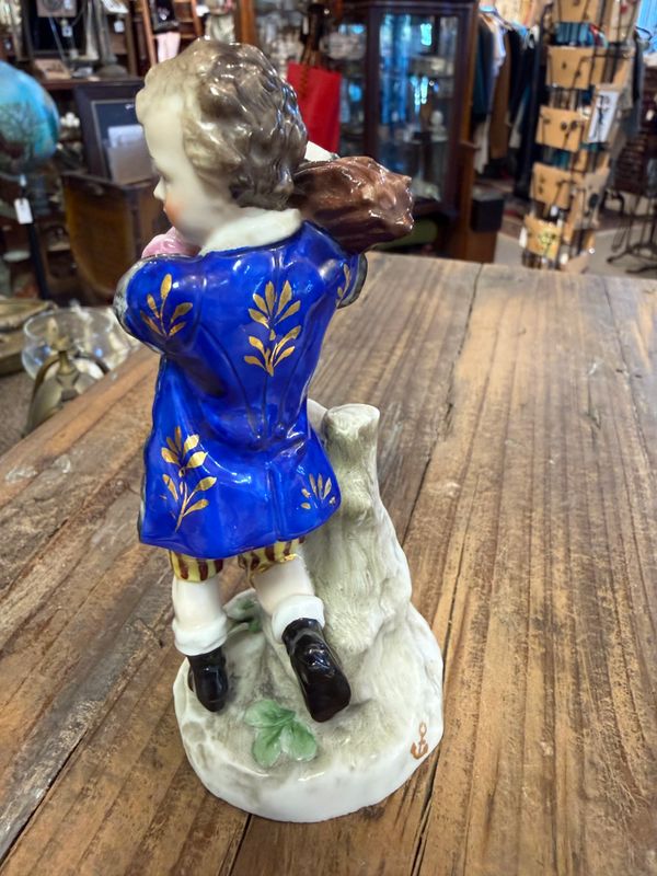 Chelsea Derby Victorian Porcelain Male Figure with Wood Bundle