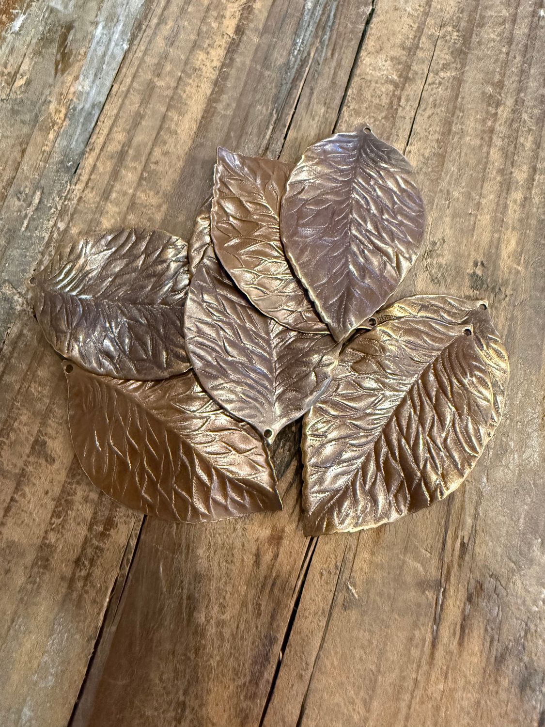 # Each Stamped Bronze Pendant Leaves