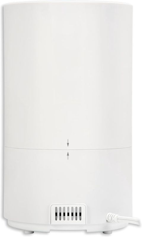 Modern cool mist ultrasonic humidifier with sleek white design, water tank, and aromatherapy diffuser feature for home use.