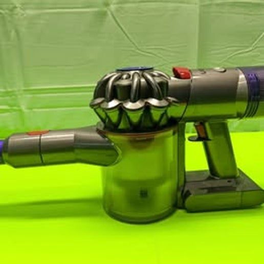Side view of Dyson V7 Animal vacuum&#39;s dustbin with hygienic ejection mechanism