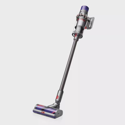 Dyson Cyclone V10 Animal vacuum and accessories arranged on a white background