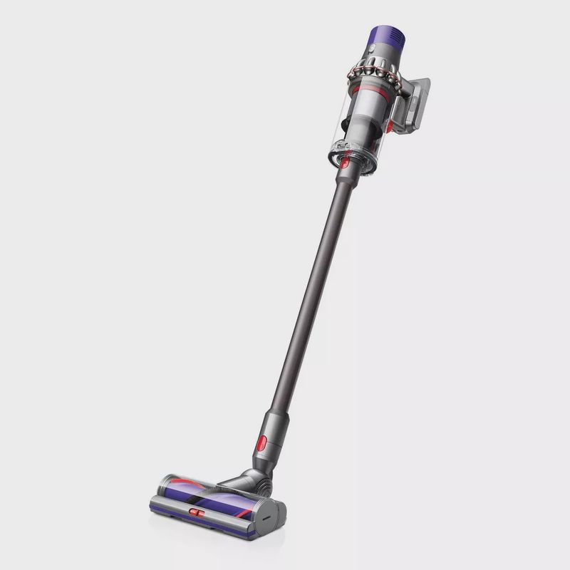 Dyson Cyclone V10 Animal vacuum and accessories arranged on a white background