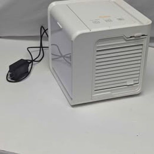 Diagonal angle of the Crane Desktop Evaporative Air Cooler &amp; Humidifier highlighting its compact design and water tank