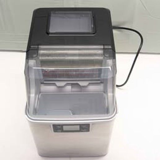 Top-down view of the Insignia Portable Clear Ice Maker, highlighting its compact design and ice-making mechanism.