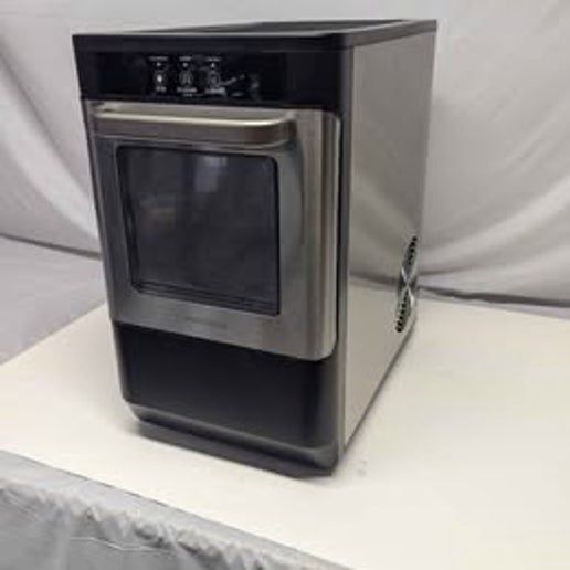 Insignia Portable Nugget Ice Maker in stainless steel with front control panel and ice storage compartment.