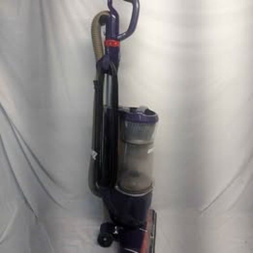 Side profile of Hoover PowerDrive Pet Bagless Upright Vacuum Cleaner UH74210M showcasing its  large dirt cup.