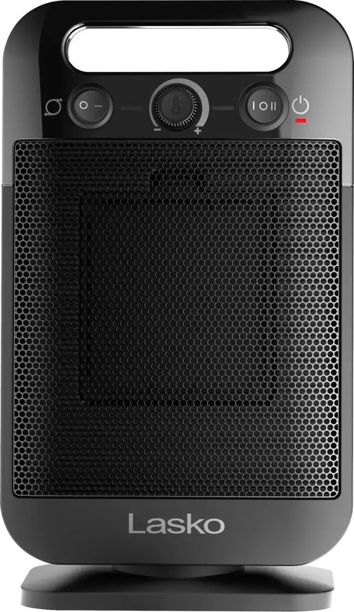 Front view of Lasko 1500 W tabletop ceramic heater in white with control knobs and grill.