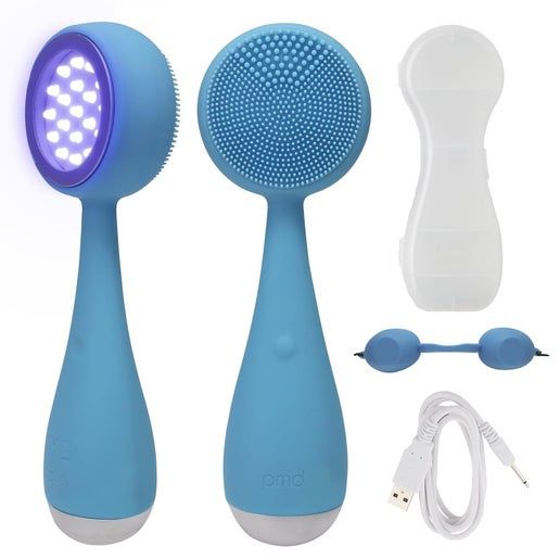 PMD Beauty Clean Acne Smart Facial Cleansing Device in blue, showcasing its sleek design and LED light therapy feature.