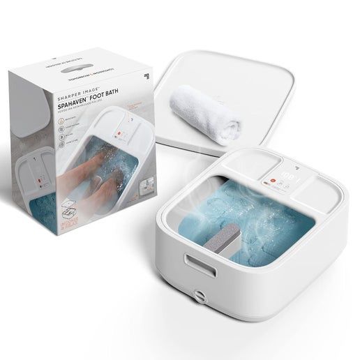 Sharper Image Hydro Spa Plus Foot Bath Massager positioned beside its retail packaging, showcasing the product and branding.