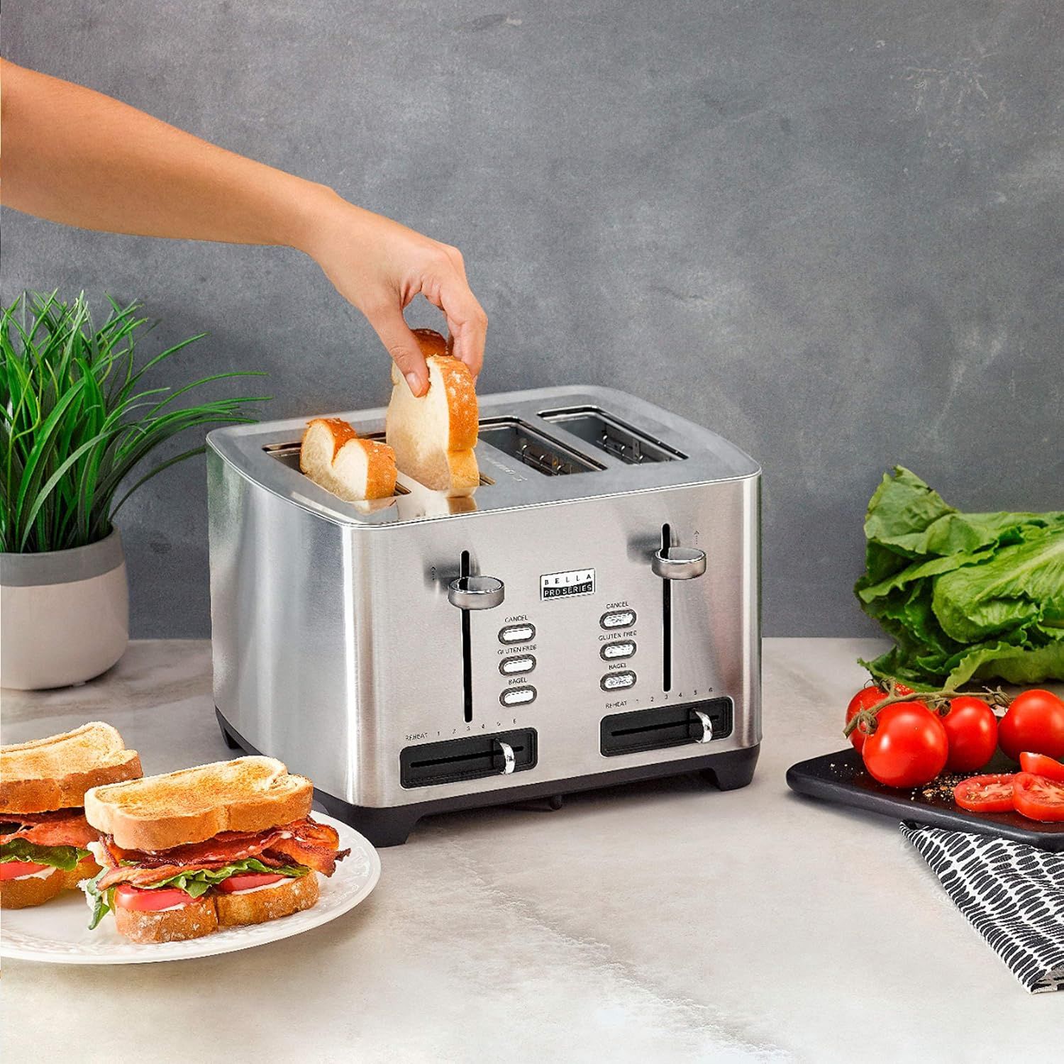Bella Pro Series 4-Slice Toaster toasting bread slices with wide slots and self-centering feature