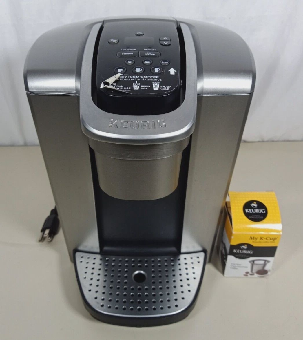 Front view of the Keurig K-Elite K90 single-serve coffee maker with sleek design and digital display.