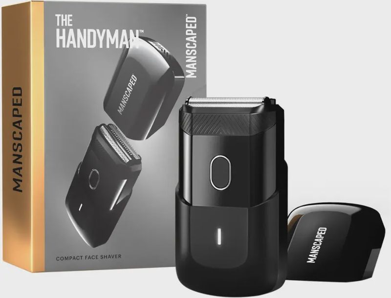Manscaped The Handyman Compact Electric Shaver displayed next to its packaging box.

