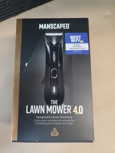Packaging box of MANSCAPED The Lawn Mower 4.0 Electric Trimmer featuring product branding and key features.