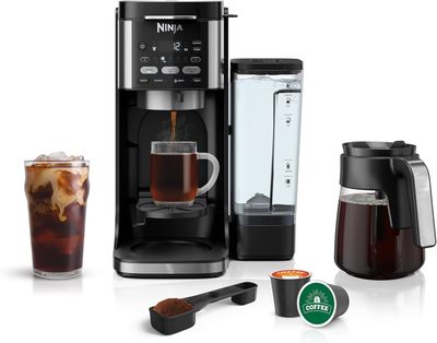 Ninja CFP101 brewing a hot cup of coffee into a mug, demonstrating its Classic brew style.