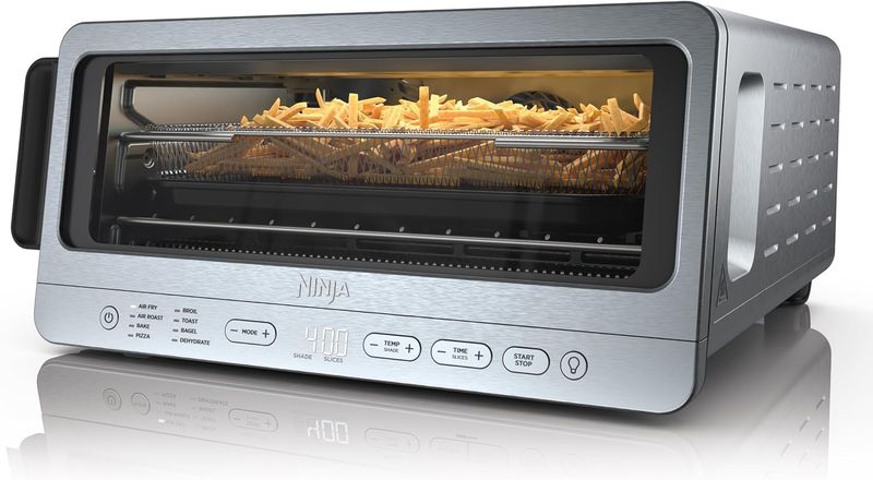 Front view of Ninja Flip Toaster Oven &amp; Air Fryer showing door and control panel.