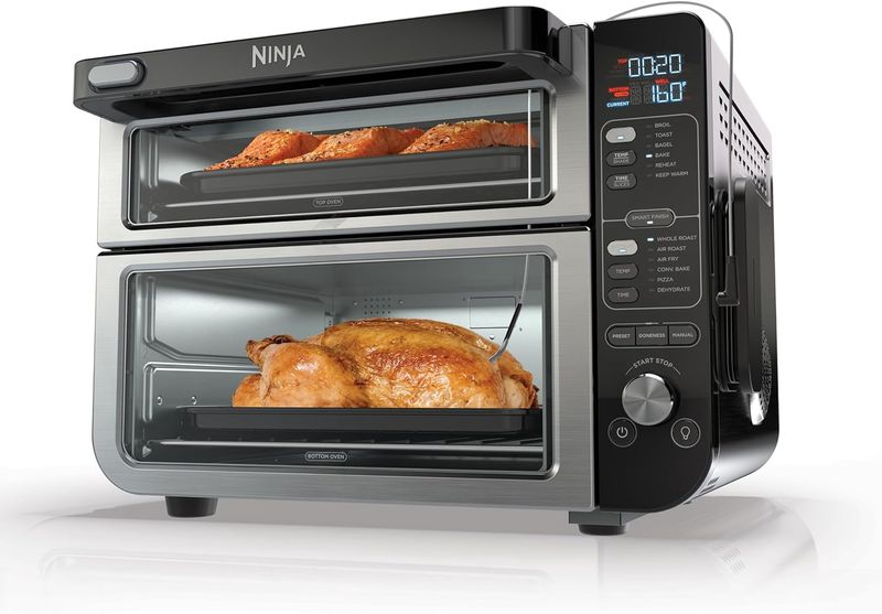 Versatile Ninja DCT451 12-in-1 Smart Double Oven with FlexDoor, featuring dual independent ovens and 12 cooking functions.