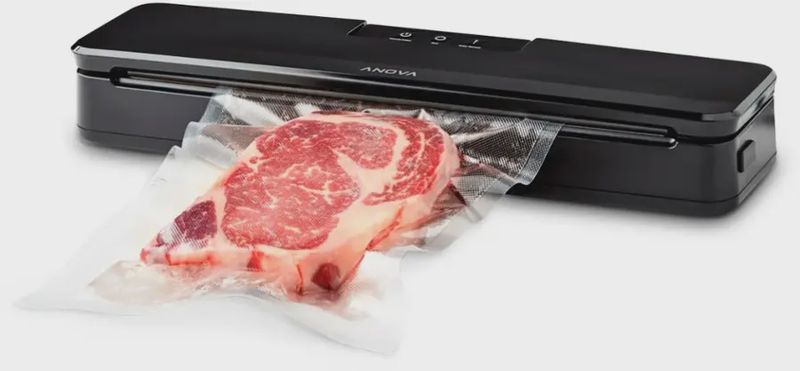 Anova Precision Vacuum Sealer Pro in black, featuring one-handed operation and built-in bag cutter