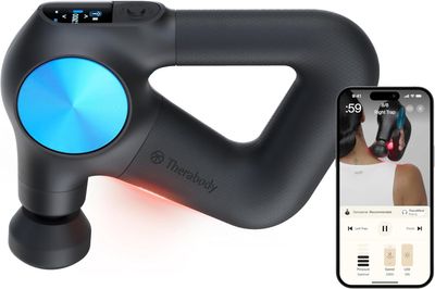 Theragun PRO Plus placed next to a smartphone displaying the Therabody app interface.