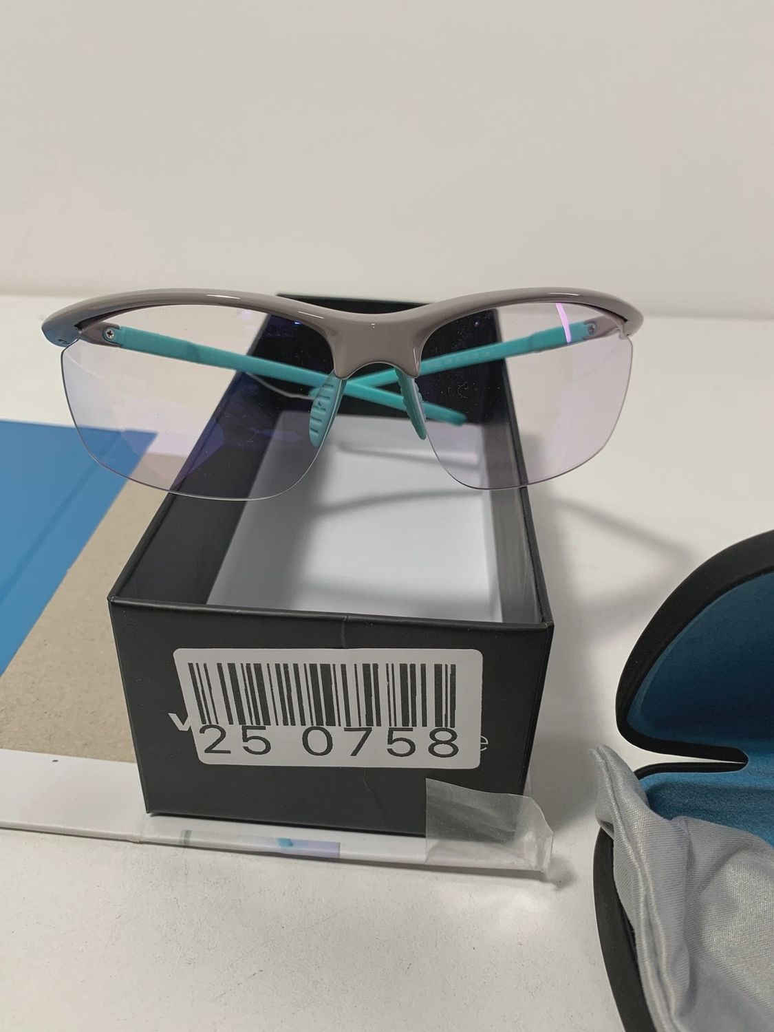 Front view of WaveBalance Excel Professional Series Gaming Glasses with clear lenses and gray frame.