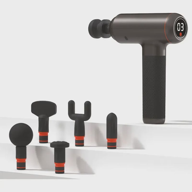 Sharper Image Powerboost massager with interchangeable heads and charging cable arranged together.