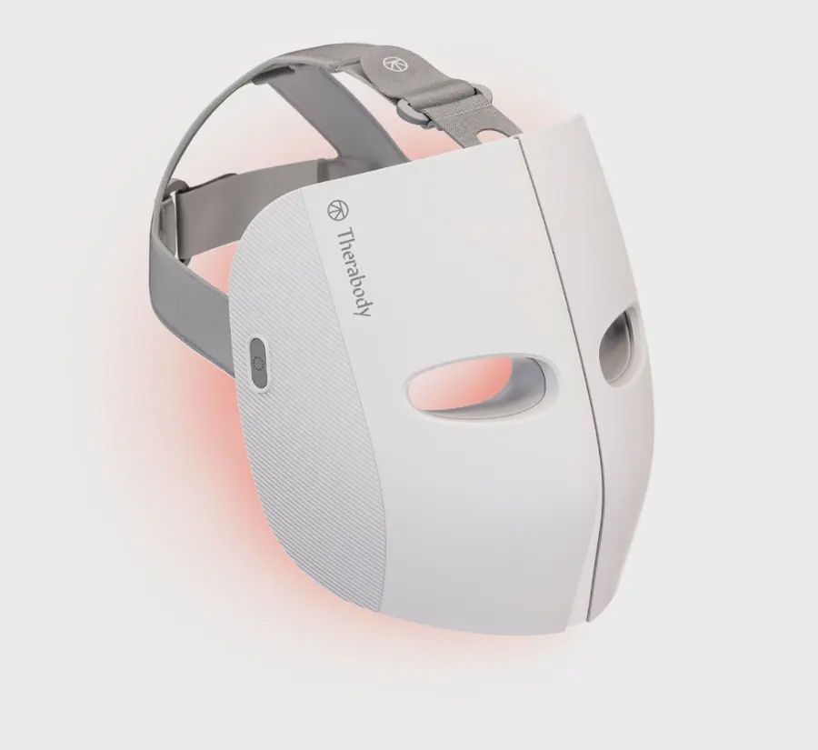 Therabody TheraFace Mask in white, front view showing LED light panels and facial contours.