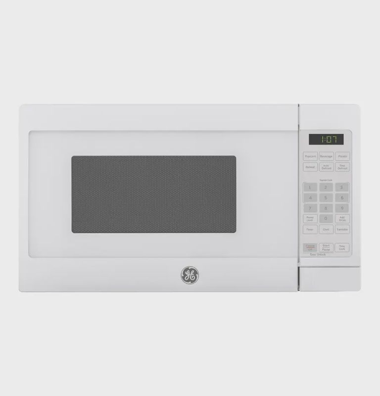 GE 0.7 Cu. Ft. countertop microwave oven in white with convenience cooking controls and compact design