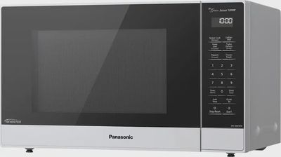 Side profile of the Panasonic SN65KW microwave highlighting its compact depth and inverter cooking system.
