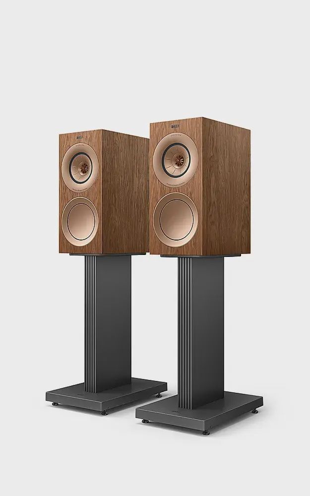 KEF R3 Meta bookshelf loudspeakers in walnut finish, showcasing the Uni-Q driver array and bass reflex ports.