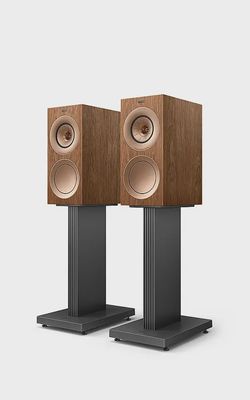 KEF R3 Meta bookshelf loudspeakers in walnut finish, showcasing the Uni-Q driver array and bass reflex ports.