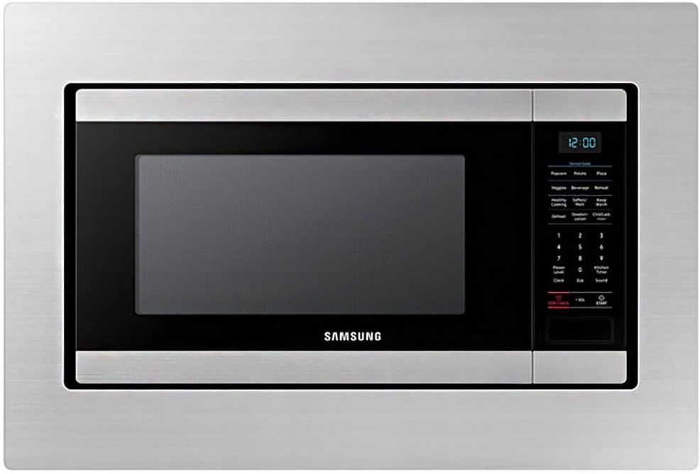 Samsung 30-inch trim kit fitted around the MS19M8000AS microwave, illustrating a seamless built-in kitchen setup.
