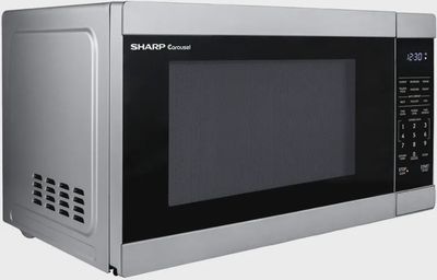 Side view of Sharp countertop microwave showing its sleek design and vents.