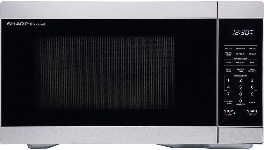 Sharp 1.1 cu. ft. countertop microwave with stainless steel finish, digital control panel, and windowed door.