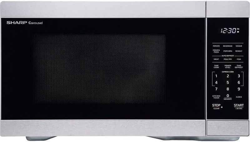 Sharp 1.1 cu. ft. countertop microwave with stainless steel finish, digital control panel, and windowed door.