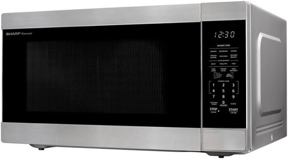 Left-side profile of the Sharp 2.2 cu ft microwave highlighting its depth and design.