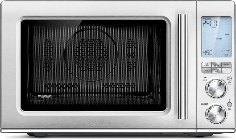 Front view of the Breville BMO870BSS Combi Wave 3-in-1 Microwave Oven in brushed stainless steel, showcasing its sleek design