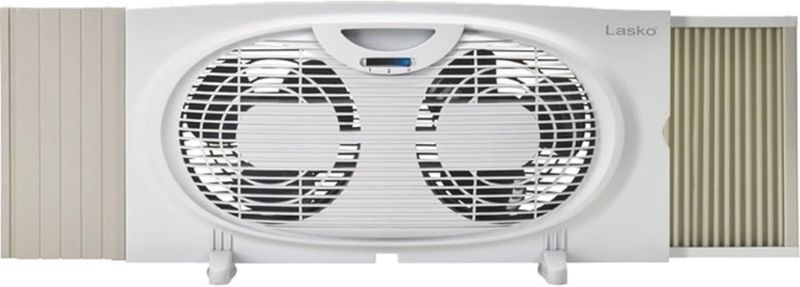 Front view of Lasko Twin Window Fan showing dual 9&quot; blades in white housing.