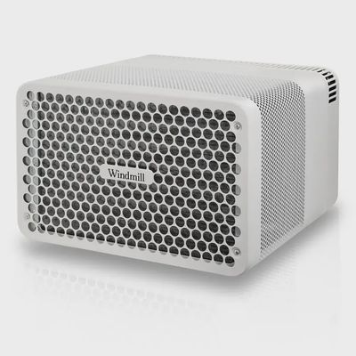 Windmill WhisperTech 8,000 BTU smart window air conditioner front view showing digital display and vent louvers.
