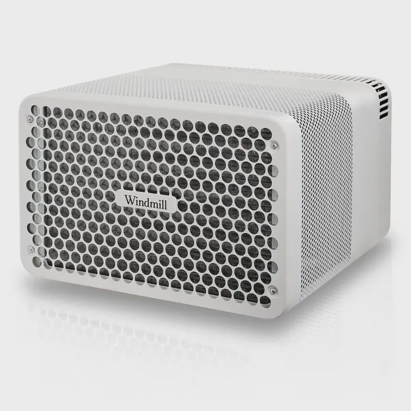 Windmill WhisperTech 8,000 BTU smart window air conditioner front view showing digital display and vent louvers.
